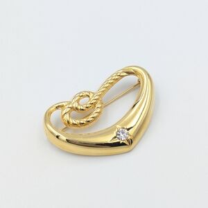 4/24$  Gold tone heart knot rhinestone brooch pin